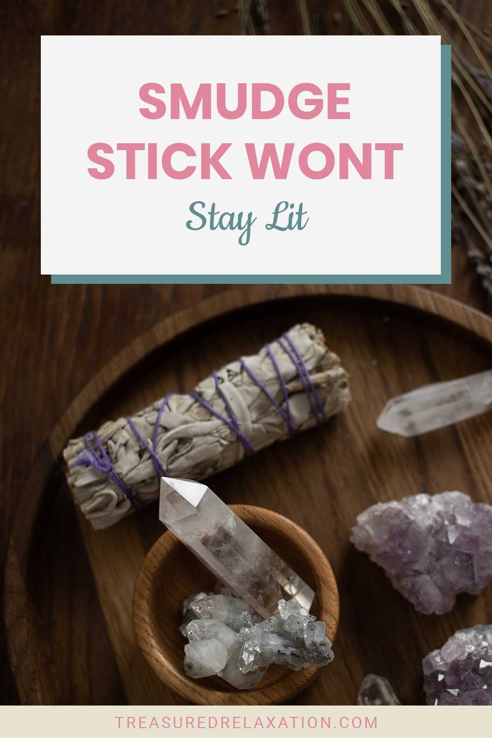 Smudge sticks on a wooden table with some crystals - Smudge Stick Wont Stay Lit