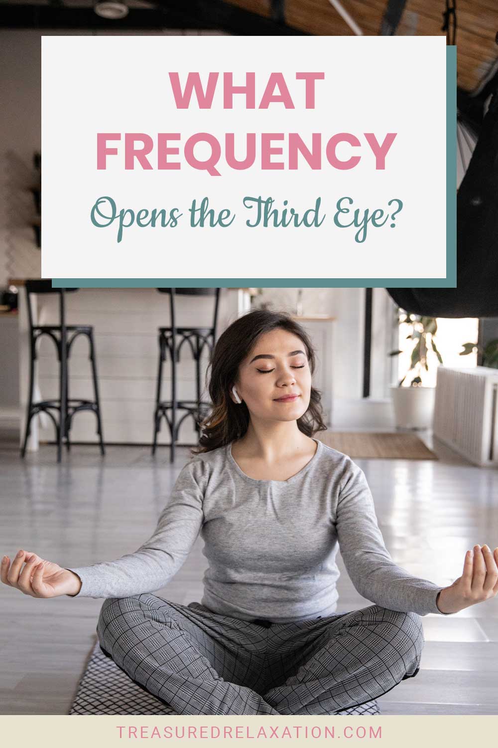 Woman meditating while listening to music with earbuds - What Frequency Opens the Third Eye?