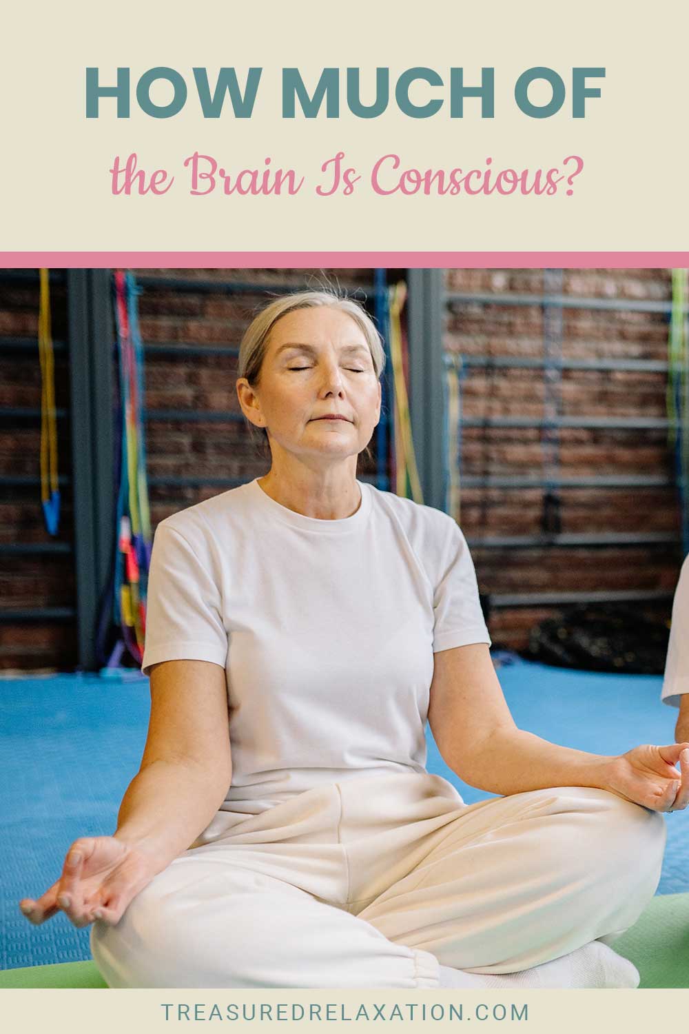 Old woman meditating on a green mat - How Much of the Brain Is Conscious?