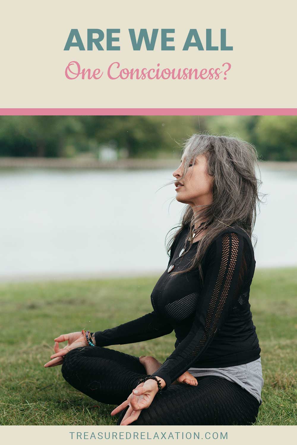 Woman in black top doing yoga near a lake - Are We All One Consciousness?